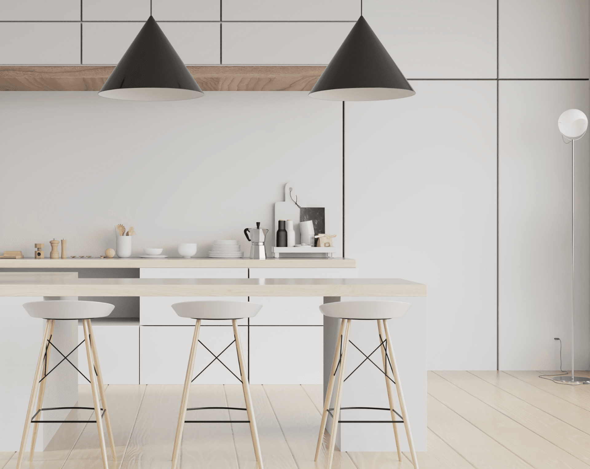 A bright Scandinavian kitchen with pale wood bar stools, open shelving, and soft daylight